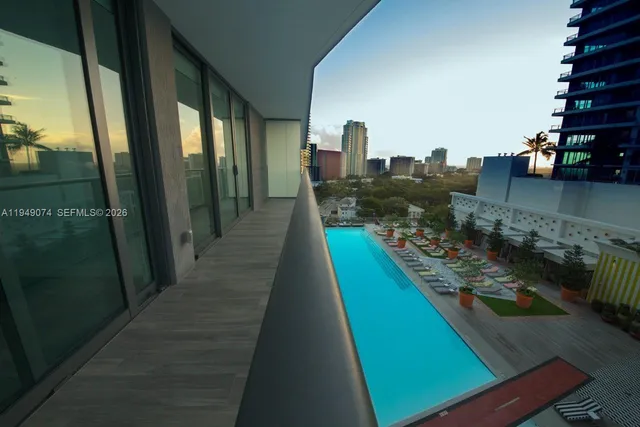 a view of a balcony with city