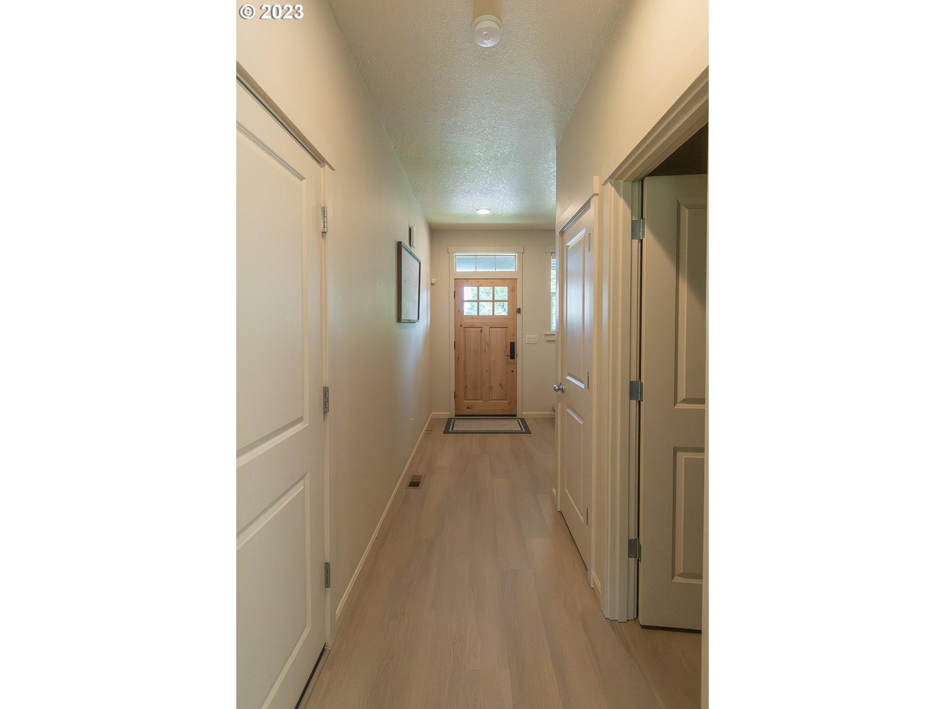 4309 North 4th Circle Ridgefield, WA 98642 - Photo 23 of 24 a view of a hallway with a white walls