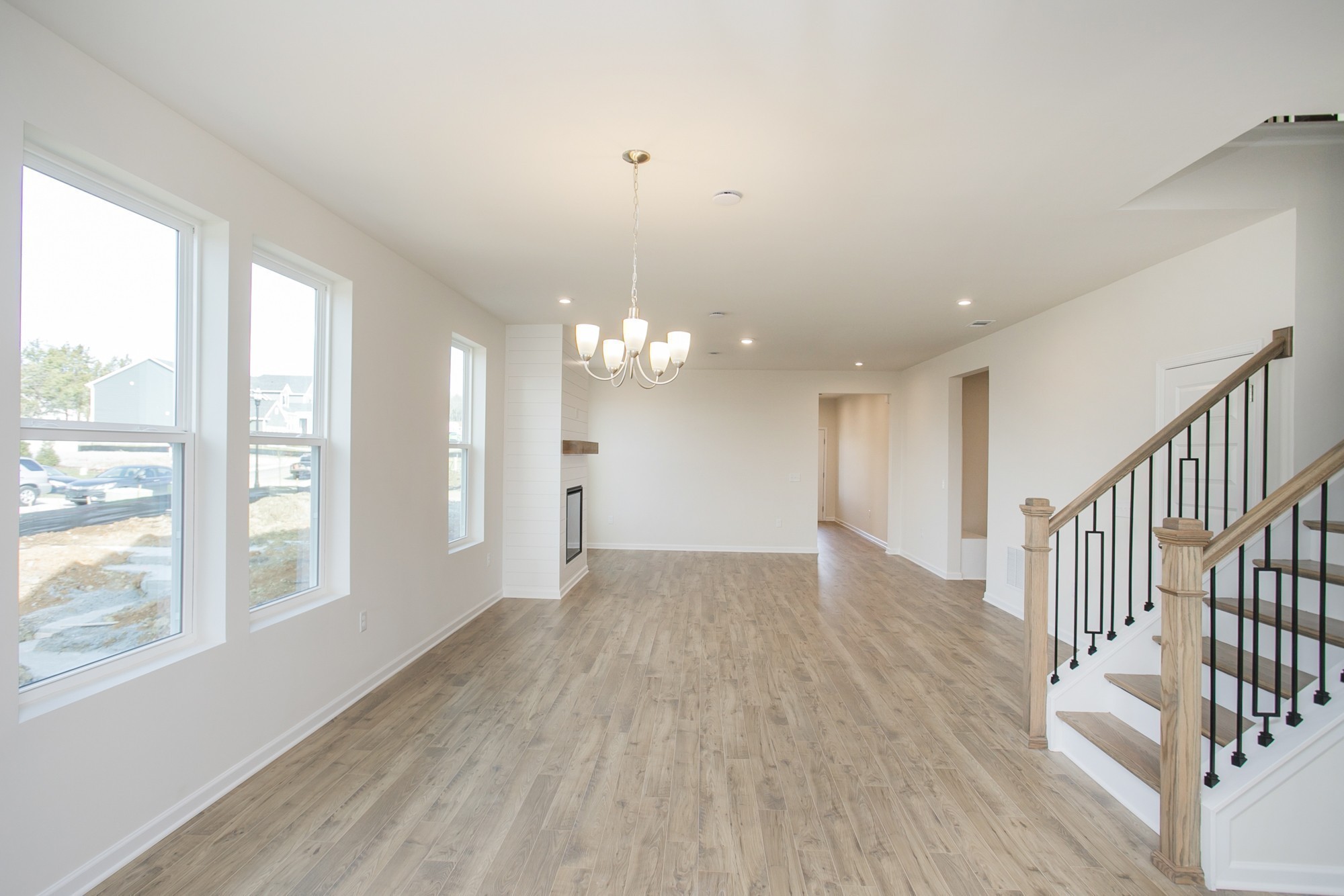 1308 Godwin Road Hermitage, TN 37076 - Photo 13 of 45 an empty room with wooden floor and windows