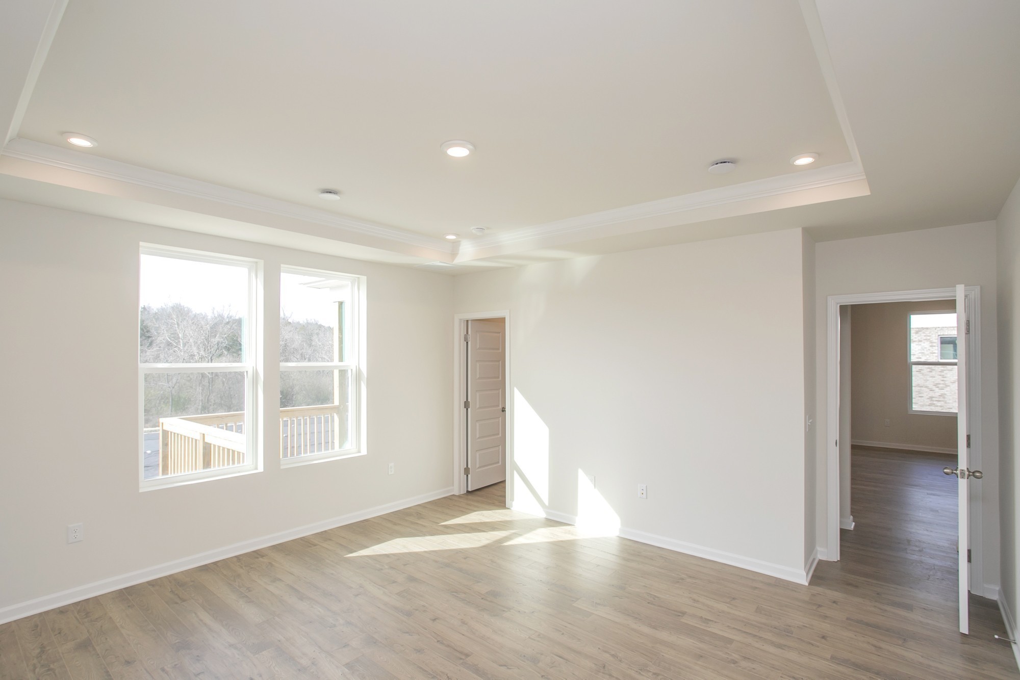 1308 Godwin Road Hermitage, TN 37076 - Photo 21 of 45 an empty room with wooden floor and windows