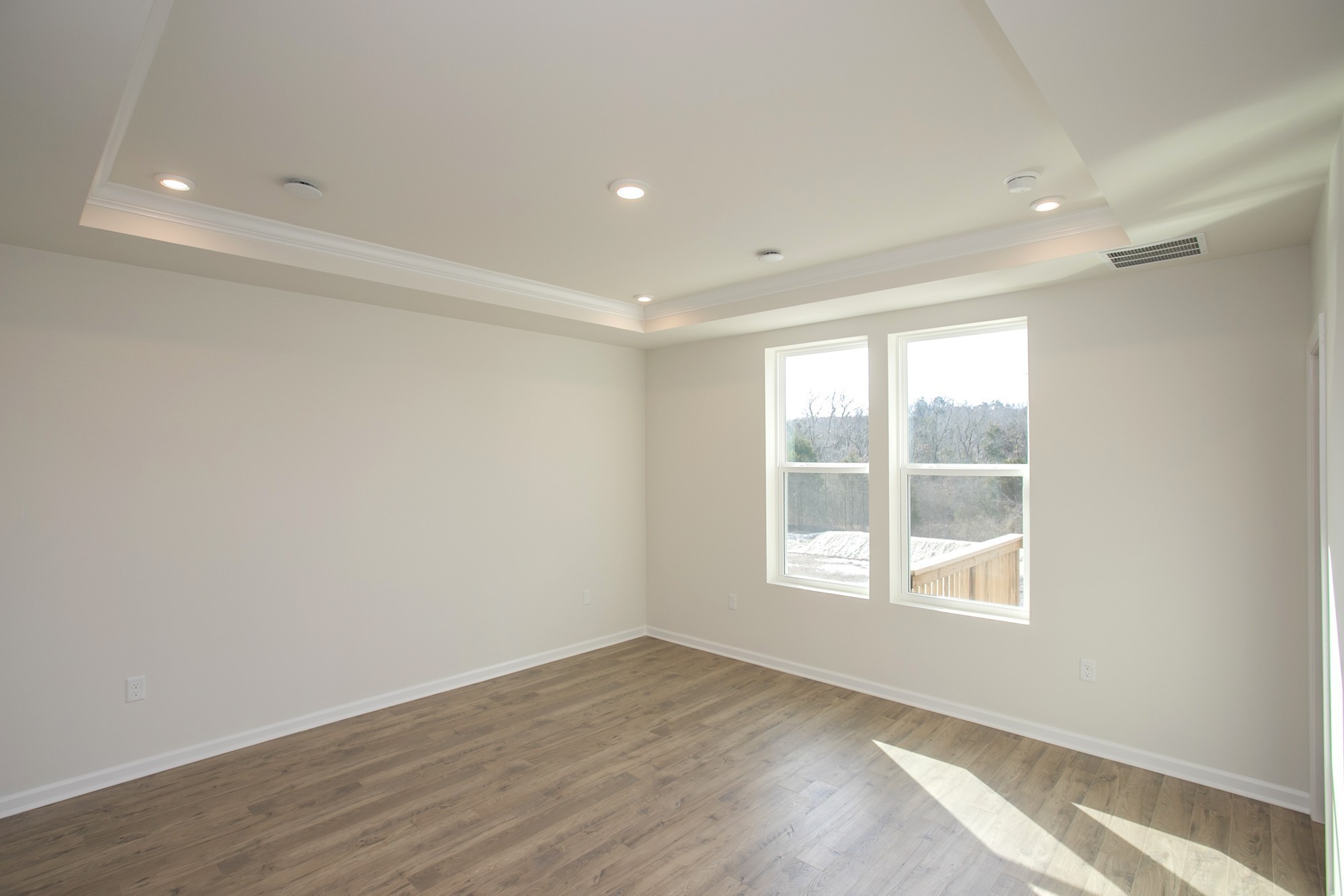 1308 Godwin Road Hermitage, TN 37076 - Photo 22 of 45 an empty room with wooden floor and windows