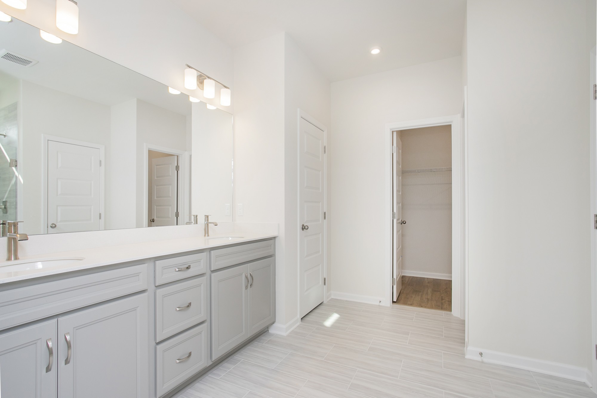 1308 Godwin Road Hermitage, TN 37076 - Photo 24 of 45 a spacious bathroom with a double vanity sink and a mirror