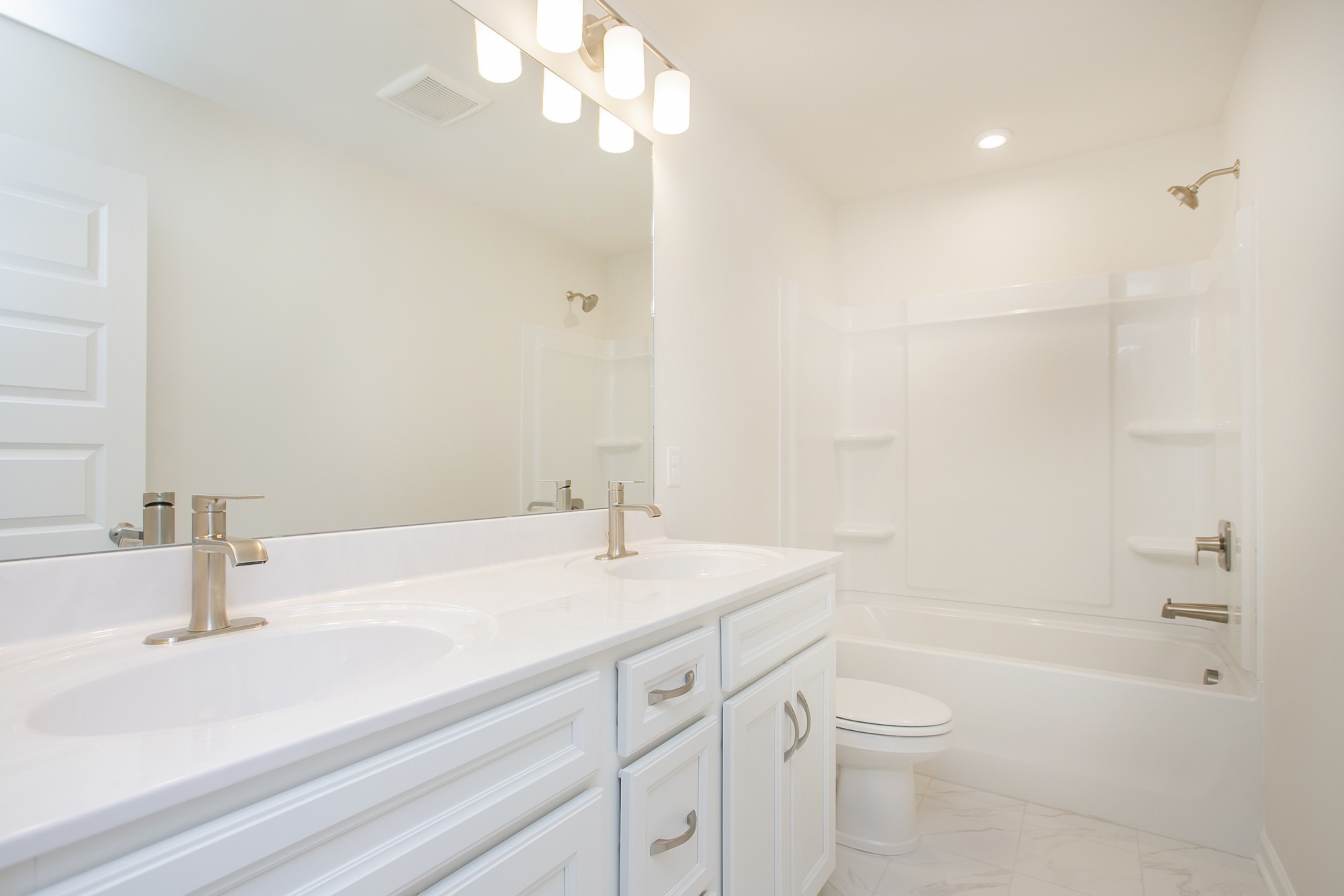 1308 Godwin Road Hermitage, TN 37076 - Photo 29 of 45 a bathroom with a sink a toilet and shower