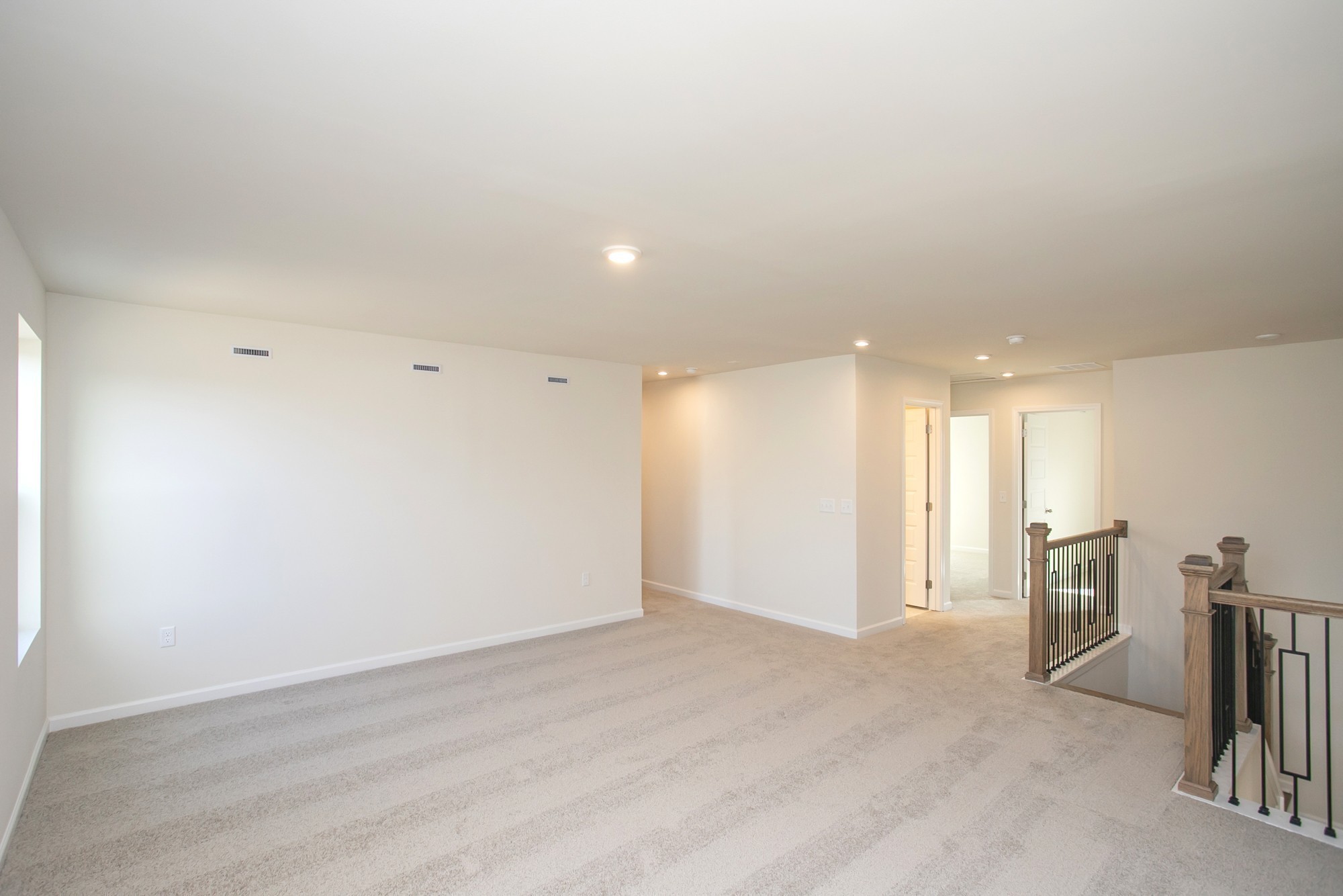 1308 Godwin Road Hermitage, TN 37076 - Photo 32 of 45 an empty room with wooden floor and windows