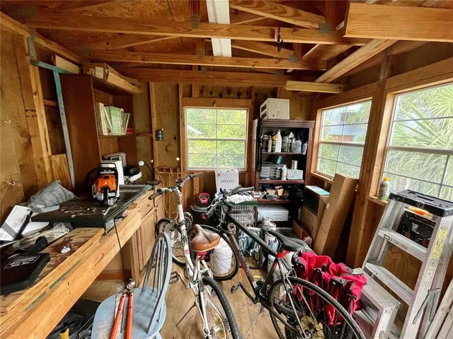 a view of a balcony with wooden floor and outdoor space