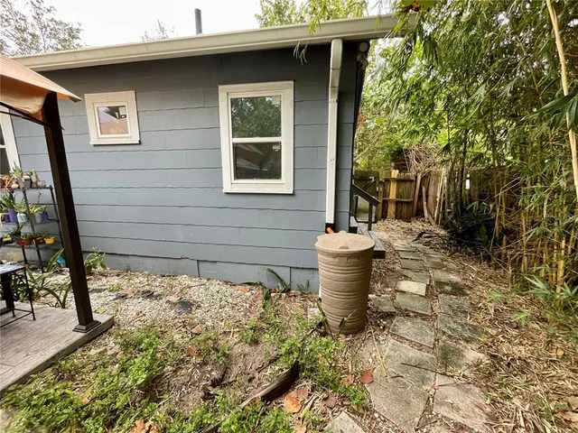 a backyard of a house with seating space