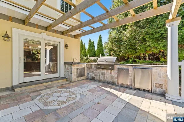 a view of a swimming pool with chairs