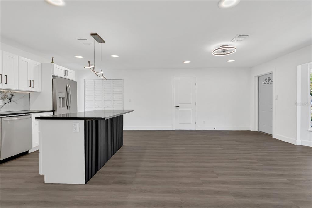 11598 Ridge Road Largo, FL 33778 - Photo 15 of 29 a view of kitchen with wooden floor