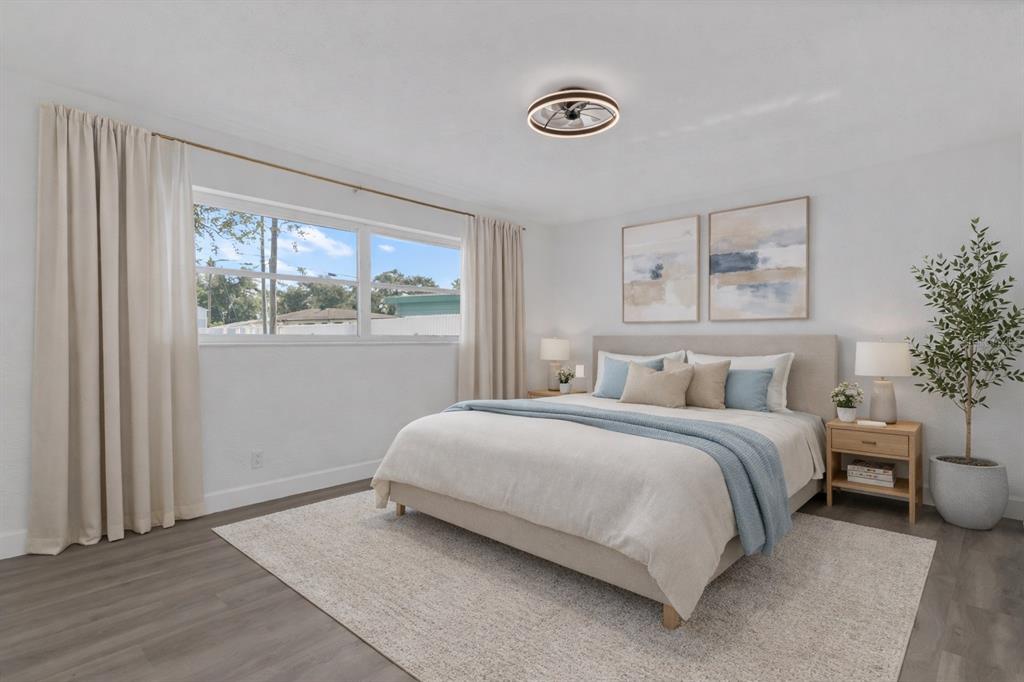 11598 Ridge Road Largo, FL 33778 - Photo 6 of 29 a bedroom with a bed and a window