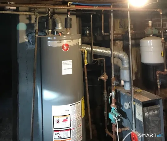 a kitchen with a refrigerator and a sink