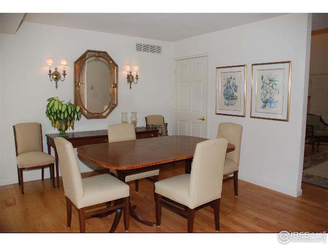 7233 Four Rivers Road Boulder, CO 80301 - Photo 2 of 12 a view of a dining room with furniture and wooden floor