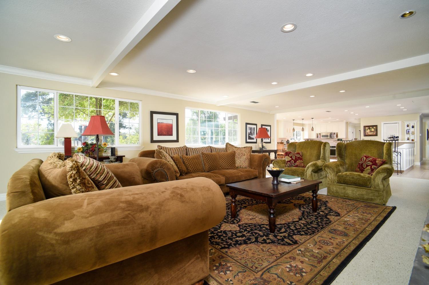 8720 Tavernor Road Wilton, CA 95693 - Photo 16 of 83 a living room with furniture kitchen view and a large window