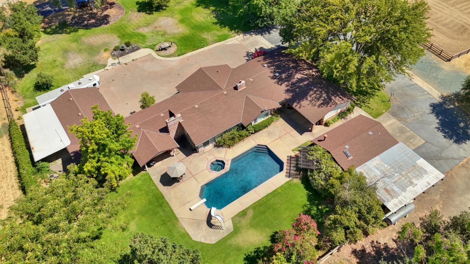 8720 Tavernor Road Wilton, CA 95693 - Photo 5 of 83 an aerial view of house with yard swimming pool and outdoor seating