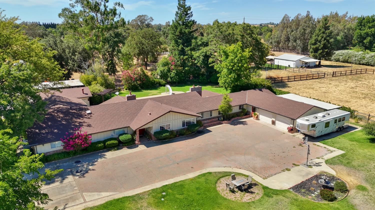 8720 Tavernor Road Wilton, CA 95693 - Photo 54 of 83 an aerial view of a house with garden space and street view