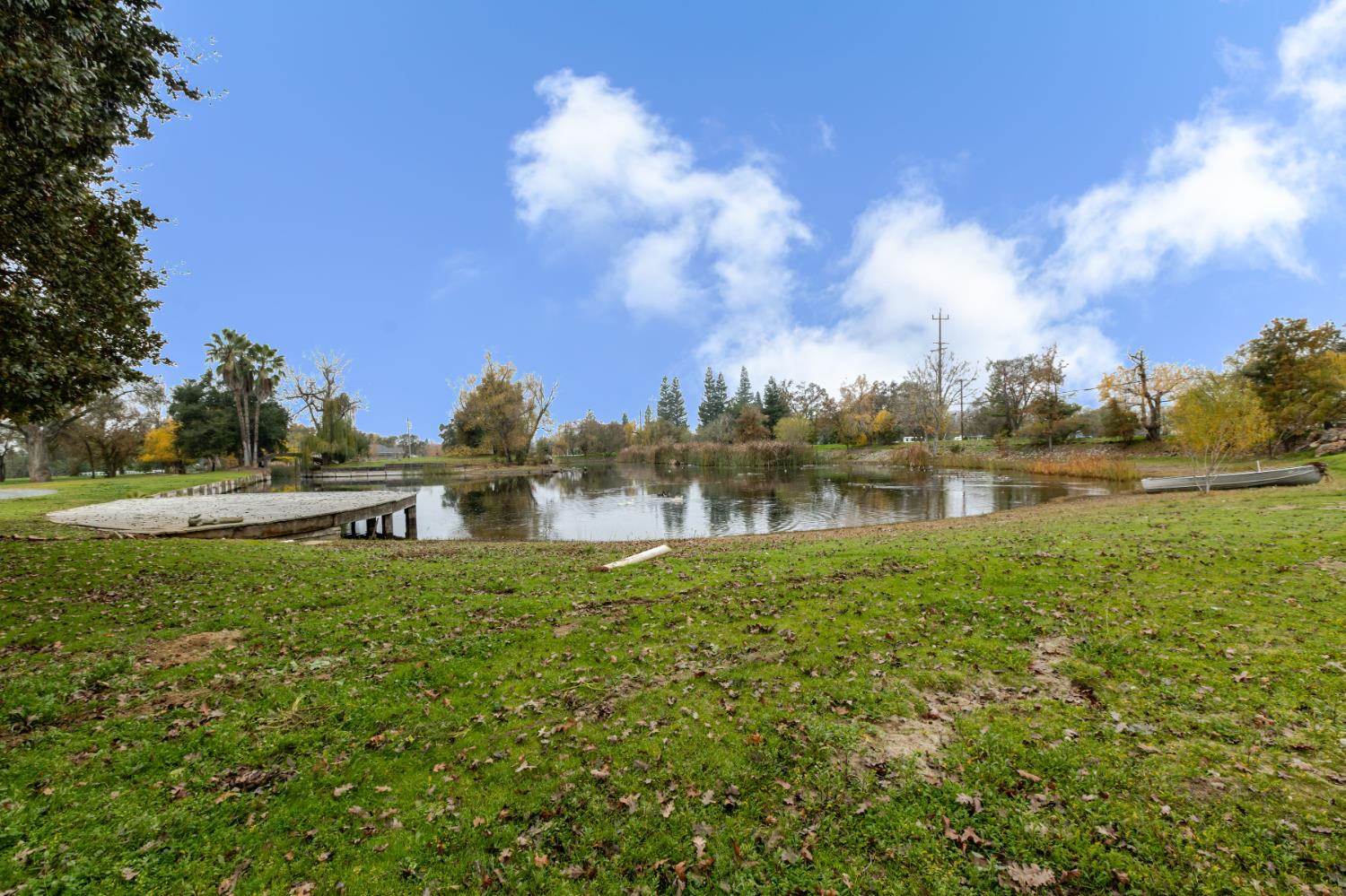 8720 Tavernor Road Wilton, CA 95693 - Photo 73 of 83 a view of a lake with houses in the background