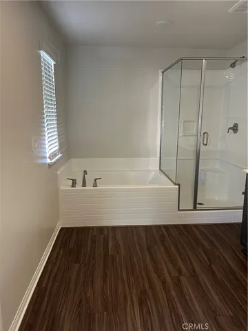 a view of a bathtub in a room