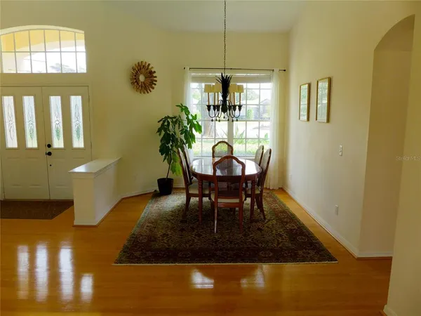 a view of a dining room with furniture