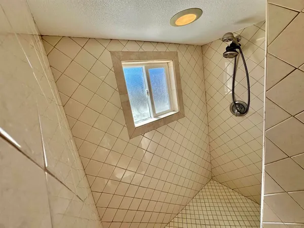 a view of a house with a sink and dishwasher