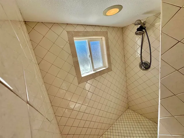 a view of a house with a sink and dishwasher