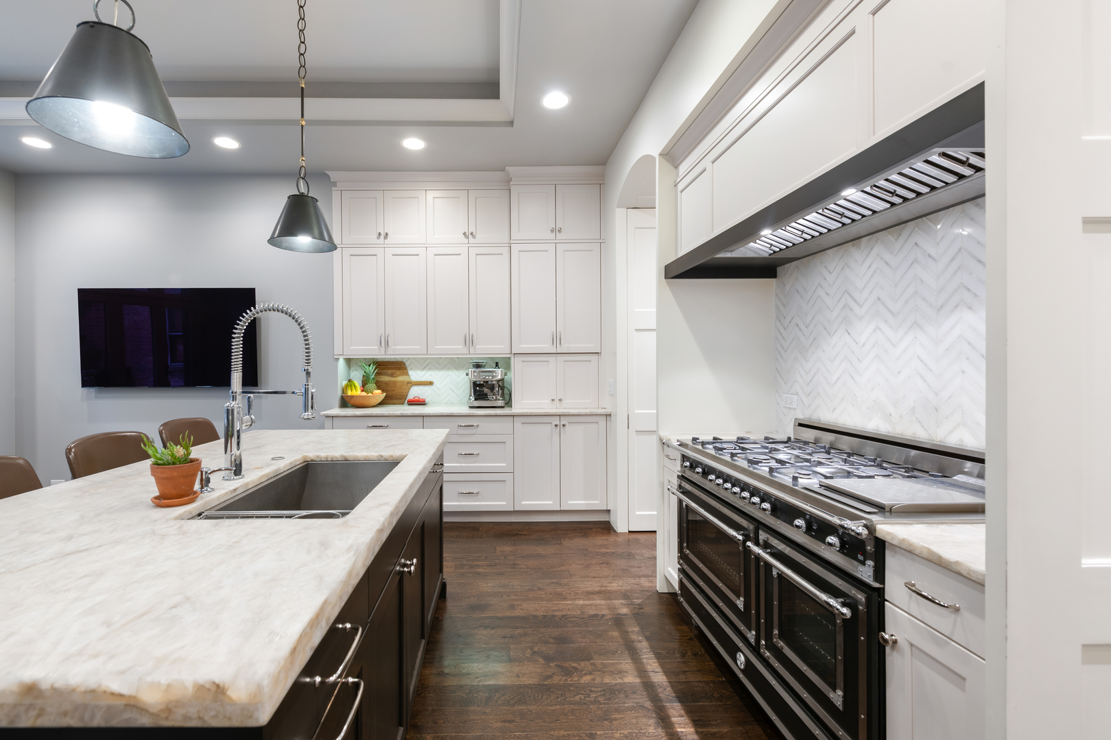 41 East Elm Street Chicago, IL 60611 - Photo 15 of 50 a kitchen with stainless steel appliances granite countertop a sink a stove and a refrigerator