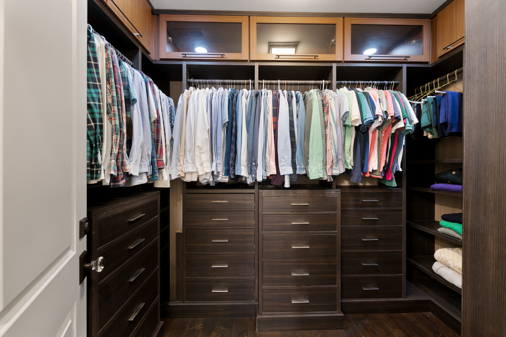 41 East Elm Street Chicago, IL 60611 - Photo 27 of 50 a view of walk in closet with clothes and shoes