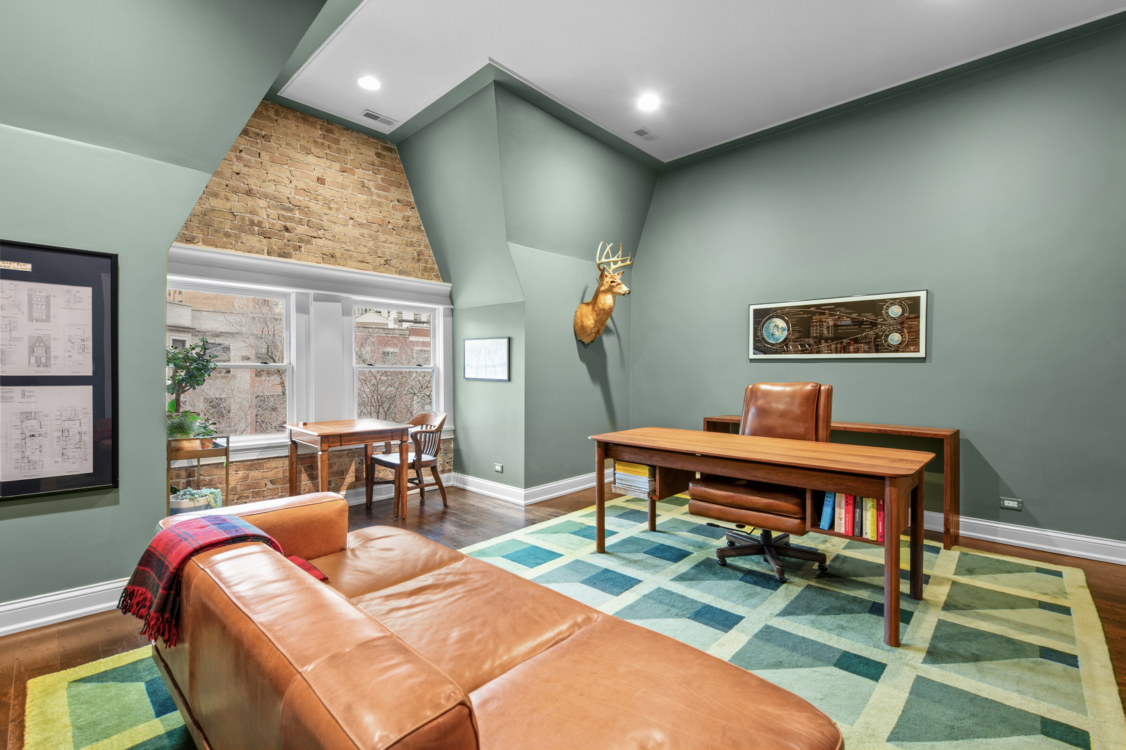 41 East Elm Street Chicago, IL 60611 - Photo 32 of 50 a living room with furniture a rug and a large window