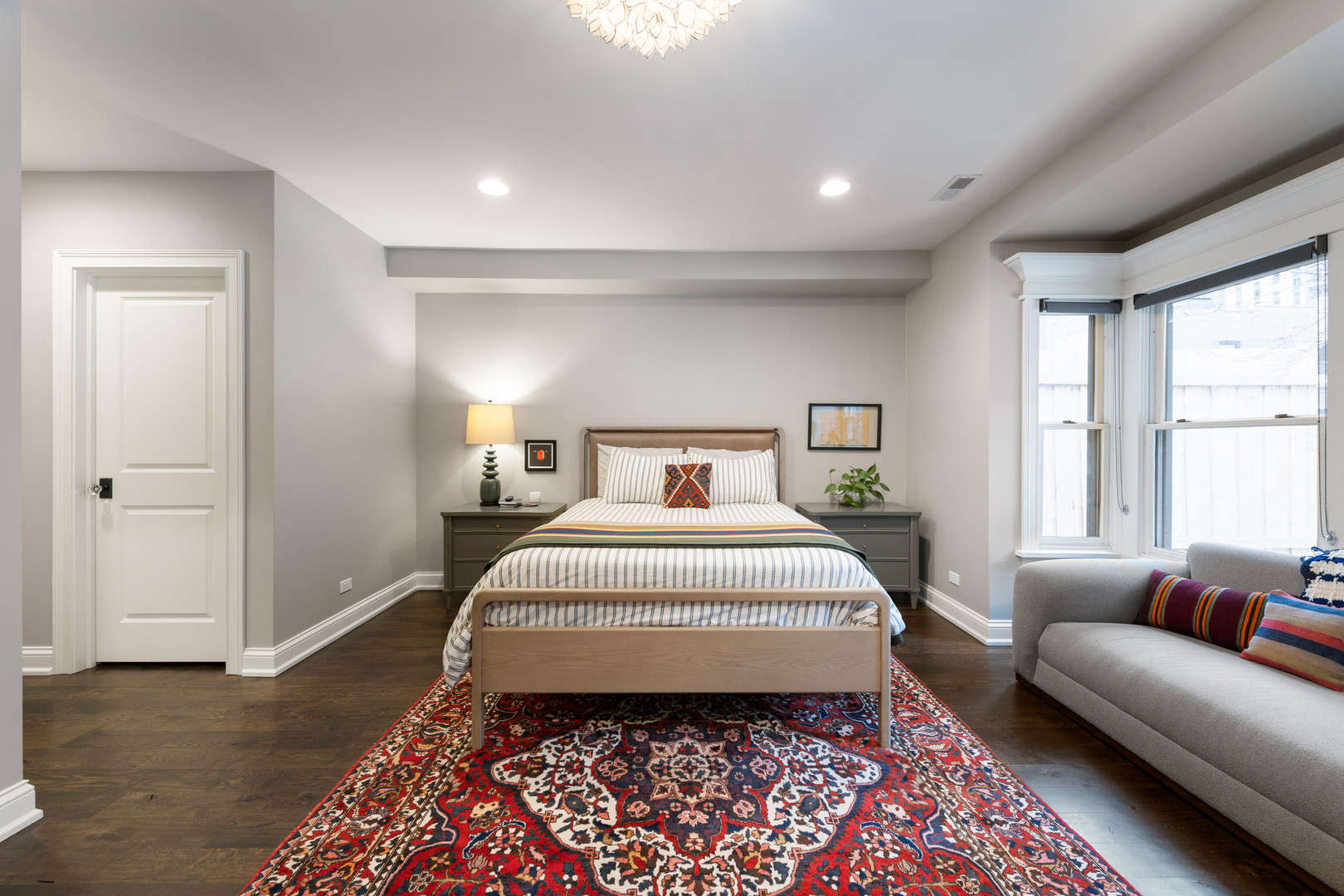 41 East Elm Street Chicago, IL 60611 - Photo 37 of 50 a bedroom with a bed and a couch