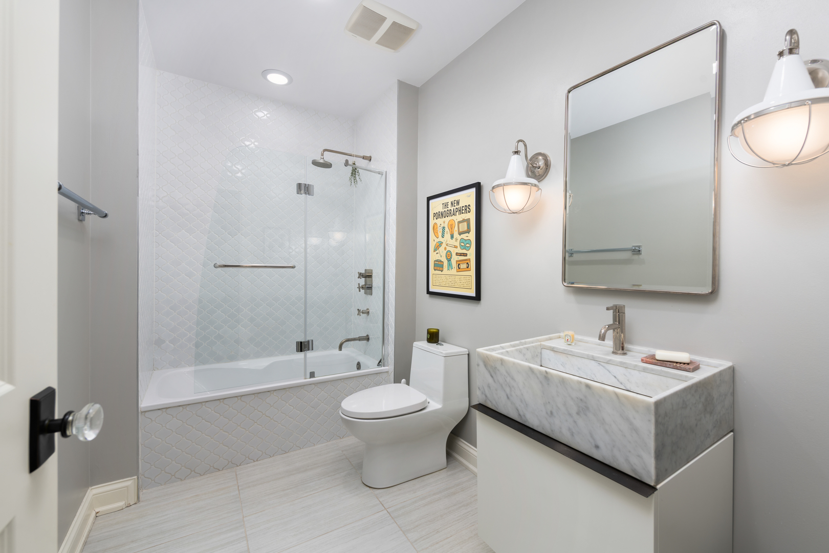 41 East Elm Street Chicago, IL 60611 - Photo 38 of 50 a bathroom with a sink toilet and shower