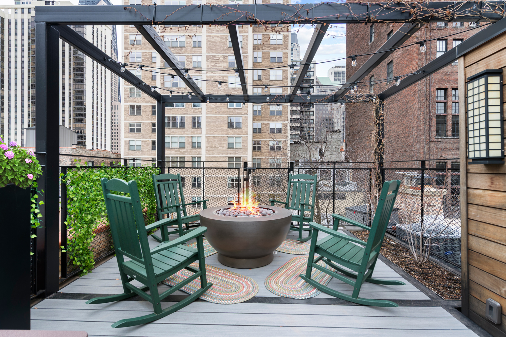 41 East Elm Street Chicago, IL 60611 - Photo 40 of 50 a building outdoor space with patio furniture and potted plants
