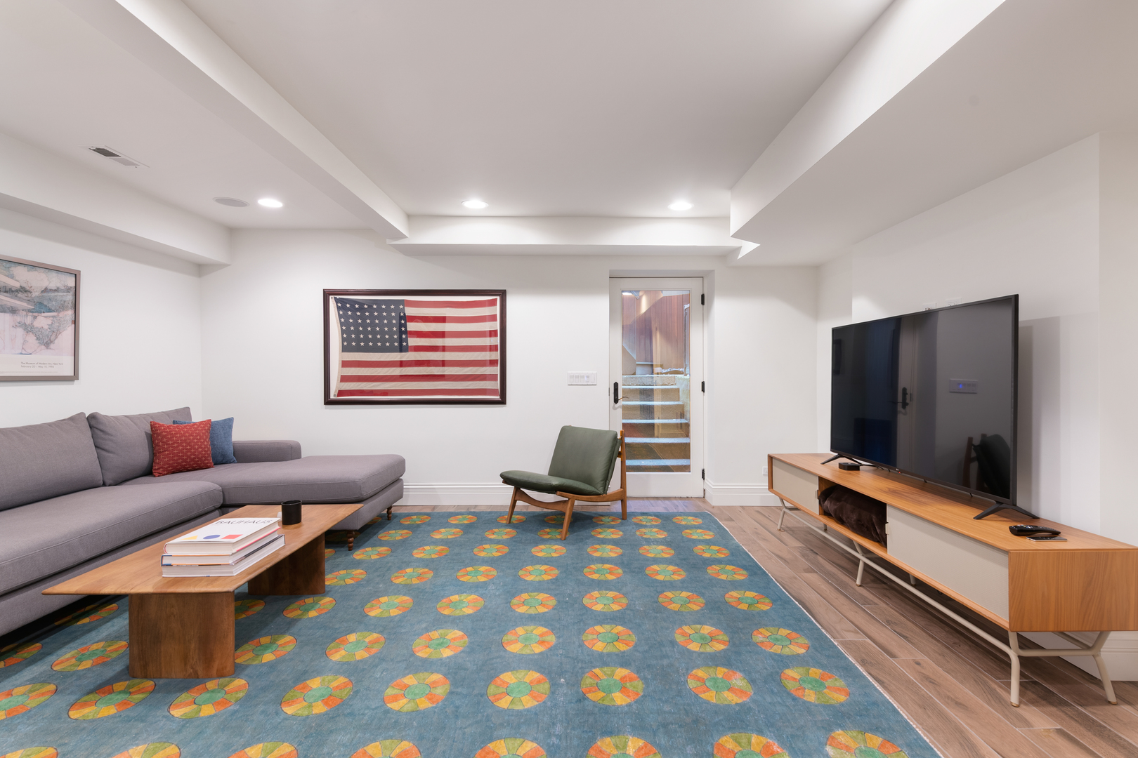 41 East Elm Street Chicago, IL 60611 - Photo 44 of 50 a living room with furniture and a flat screen tv