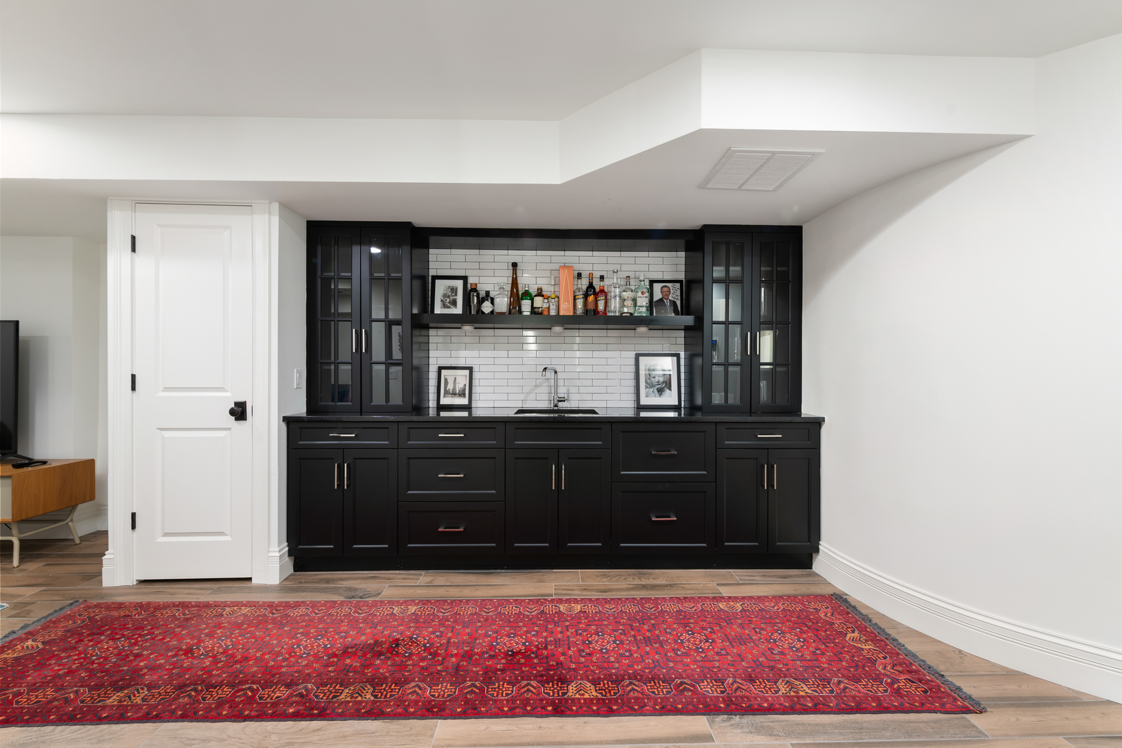 41 East Elm Street Chicago, IL 60611 - Photo 46 of 50 a living room with hard wood floors and a rug