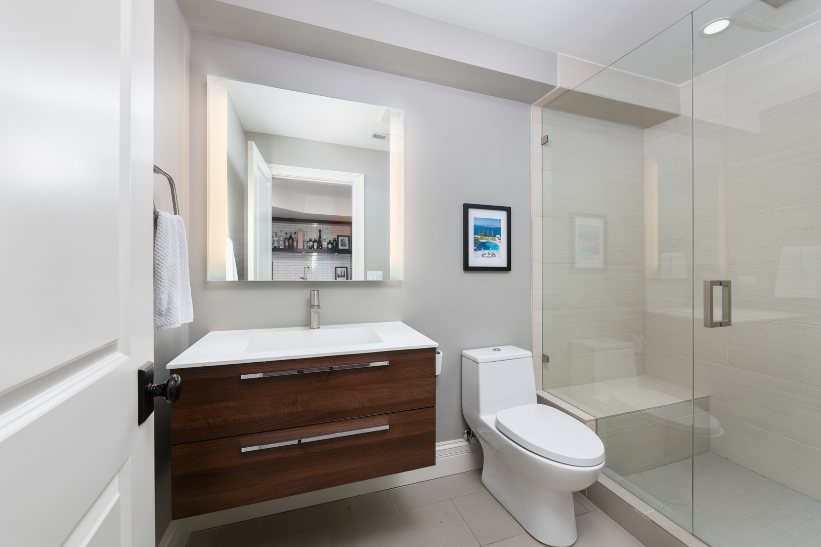 41 East Elm Street Chicago, IL 60611 - Photo 47 of 50 a bathroom with a toilet a sink and shower