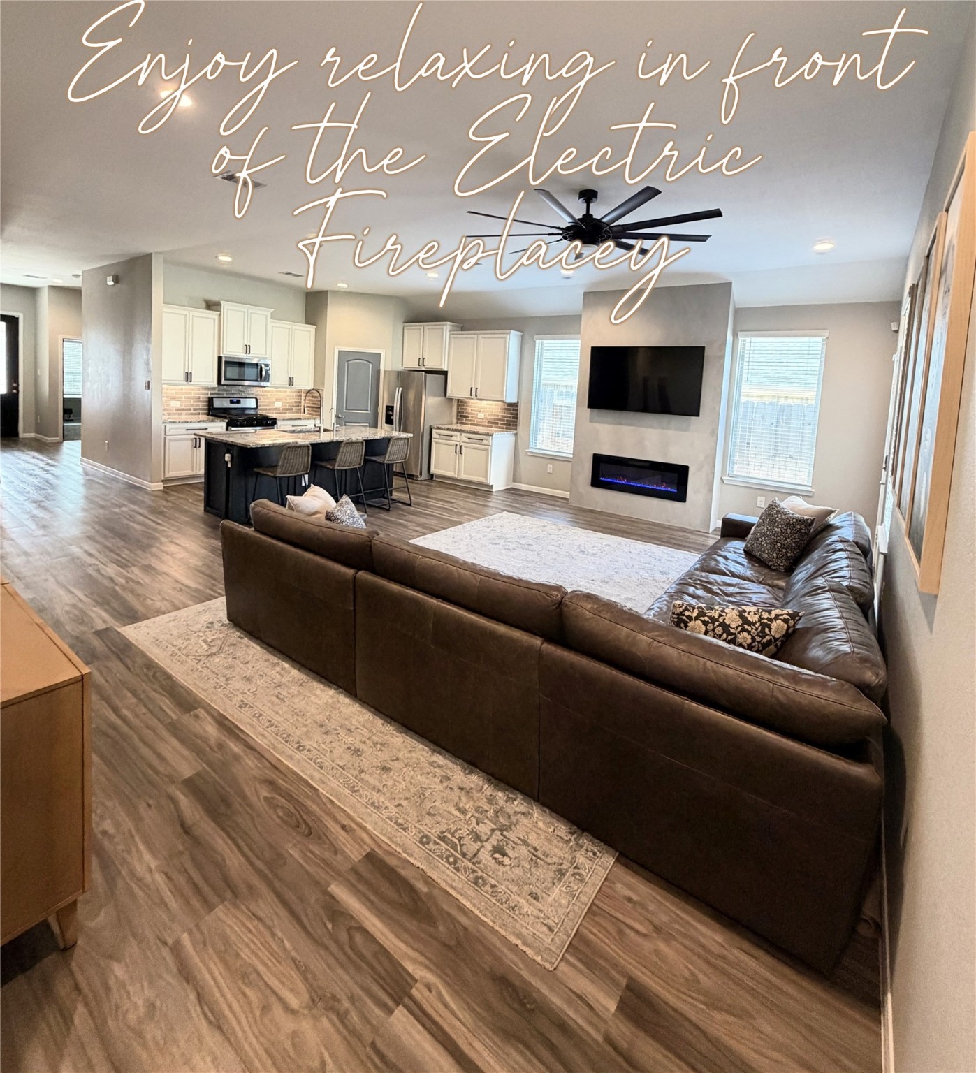 443 Stonebrook Lane Conroe, TX 77304 - Photo 1 of 21 Enjoy the Electric Fireplace, Ceiling Fan, Large Living Area with lots of natural light.