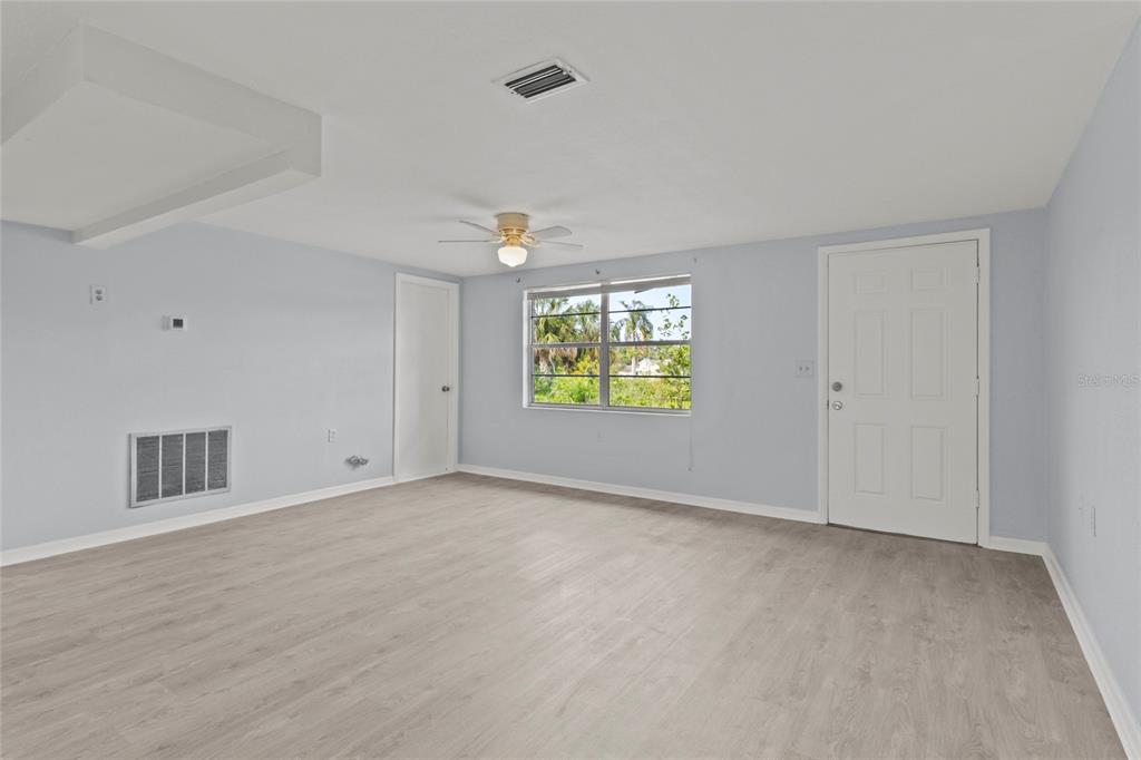 1623 Plum Tree Road Holiday, FL 34690 - Photo 10 of 33 a view of an empty room with a window