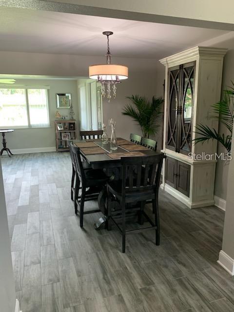 527 Eastview Road Largo, FL 33770 - Photo 6 of 14 a view of a dining room with furniture and window