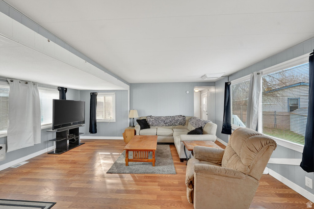 24 Grover Street Layton, UT 84041 - Photo 11 of 21 Living area featuring light wood-style floors