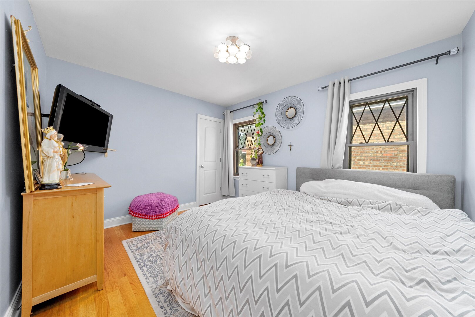 5009 South Kostner Avenue Chicago, IL 60632 - Photo 11 of 41 a bedroom with a bed and flat screen tv