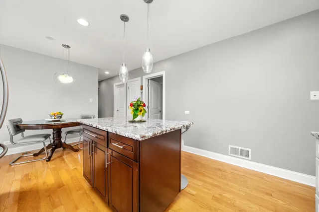 a kitchen with a sink a counter space and appliances