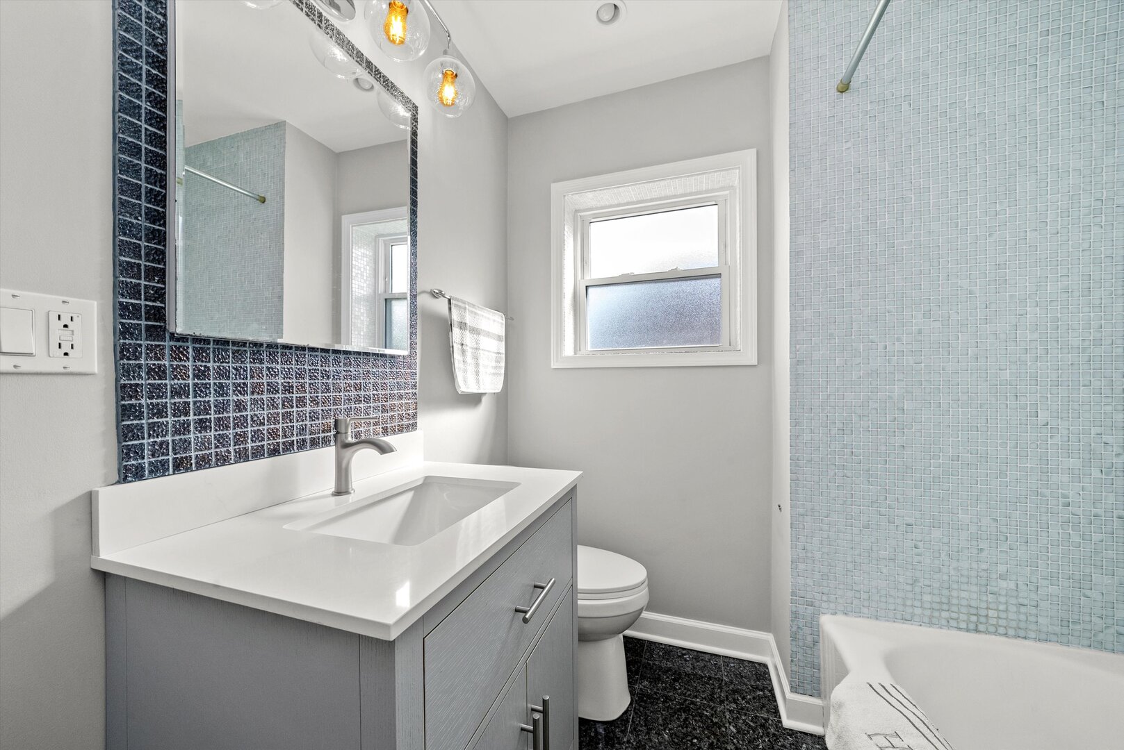 5009 South Kostner Avenue Chicago, IL 60632 - Photo 24 of 41 a bathroom with a sink and a toilet