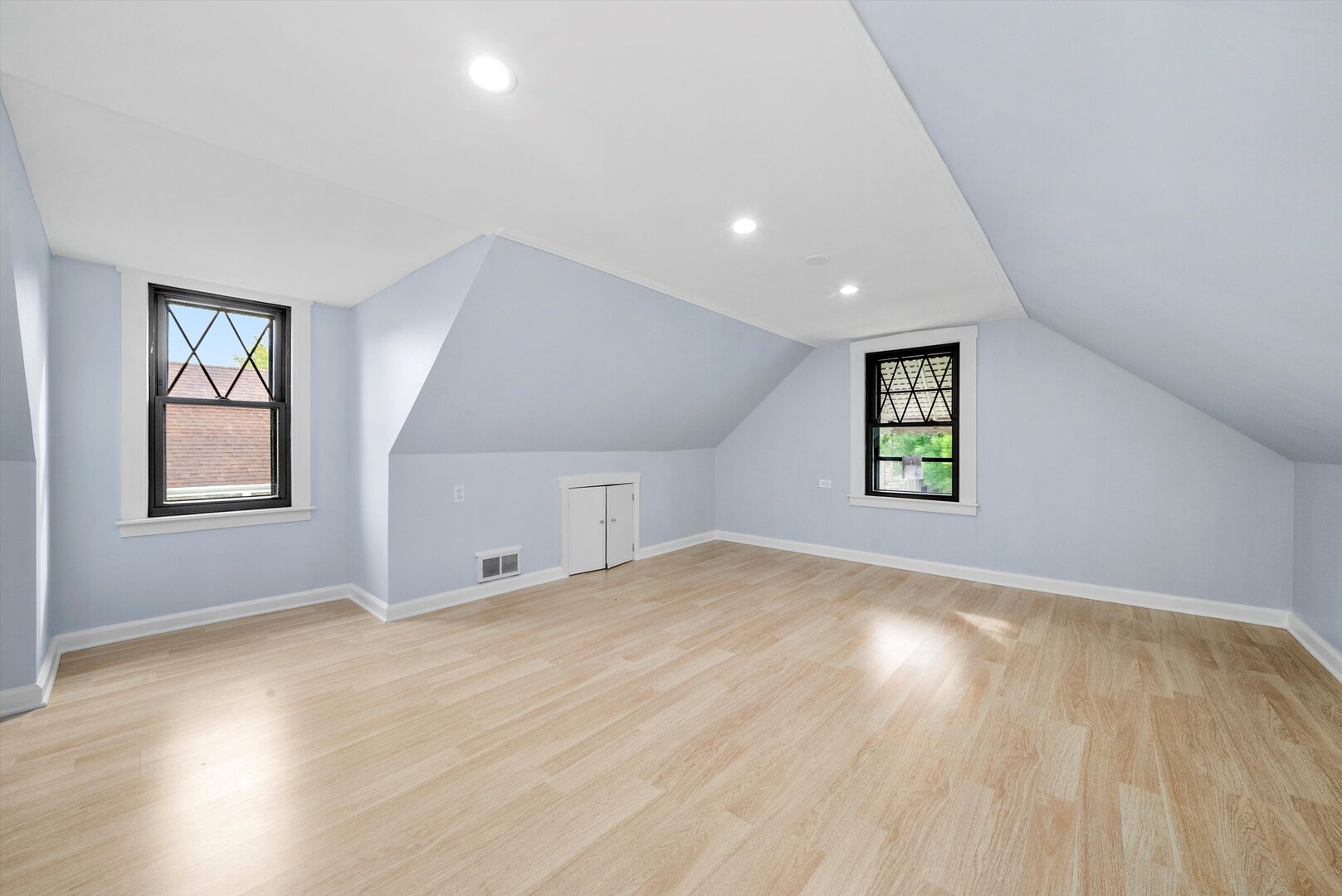 5009 South Kostner Avenue Chicago, IL 60632 - Photo 30 of 41 wooden floor in an empty room with a window