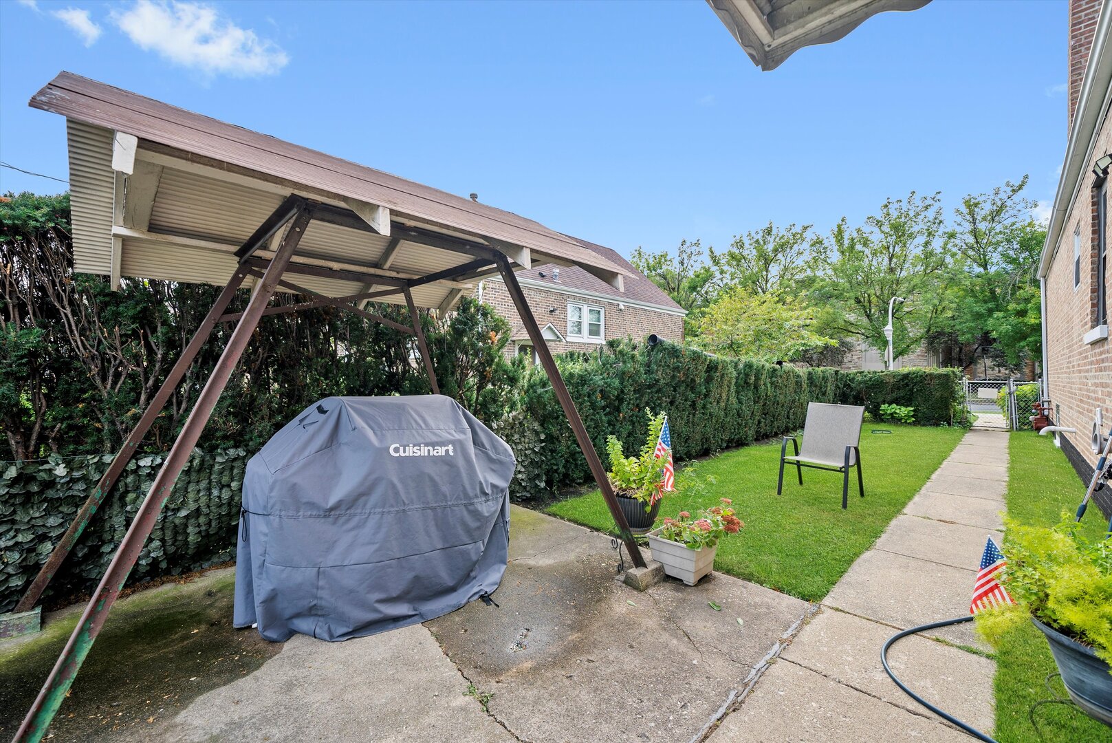 5009 South Kostner Avenue Chicago, IL 60632 - Photo 41 of 41 a view of a chair and table in the garden