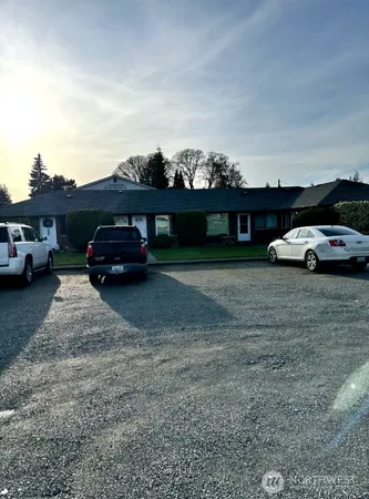 a view of street with parked cars