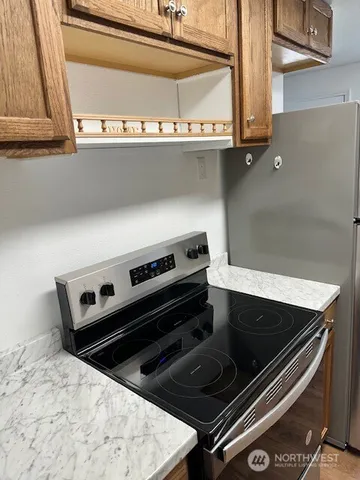 a bathroom with a shower toilet and sink