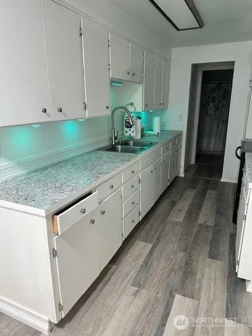 a view of a bathroom from a hallway