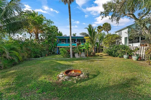 an aerial view of a city with ocean view