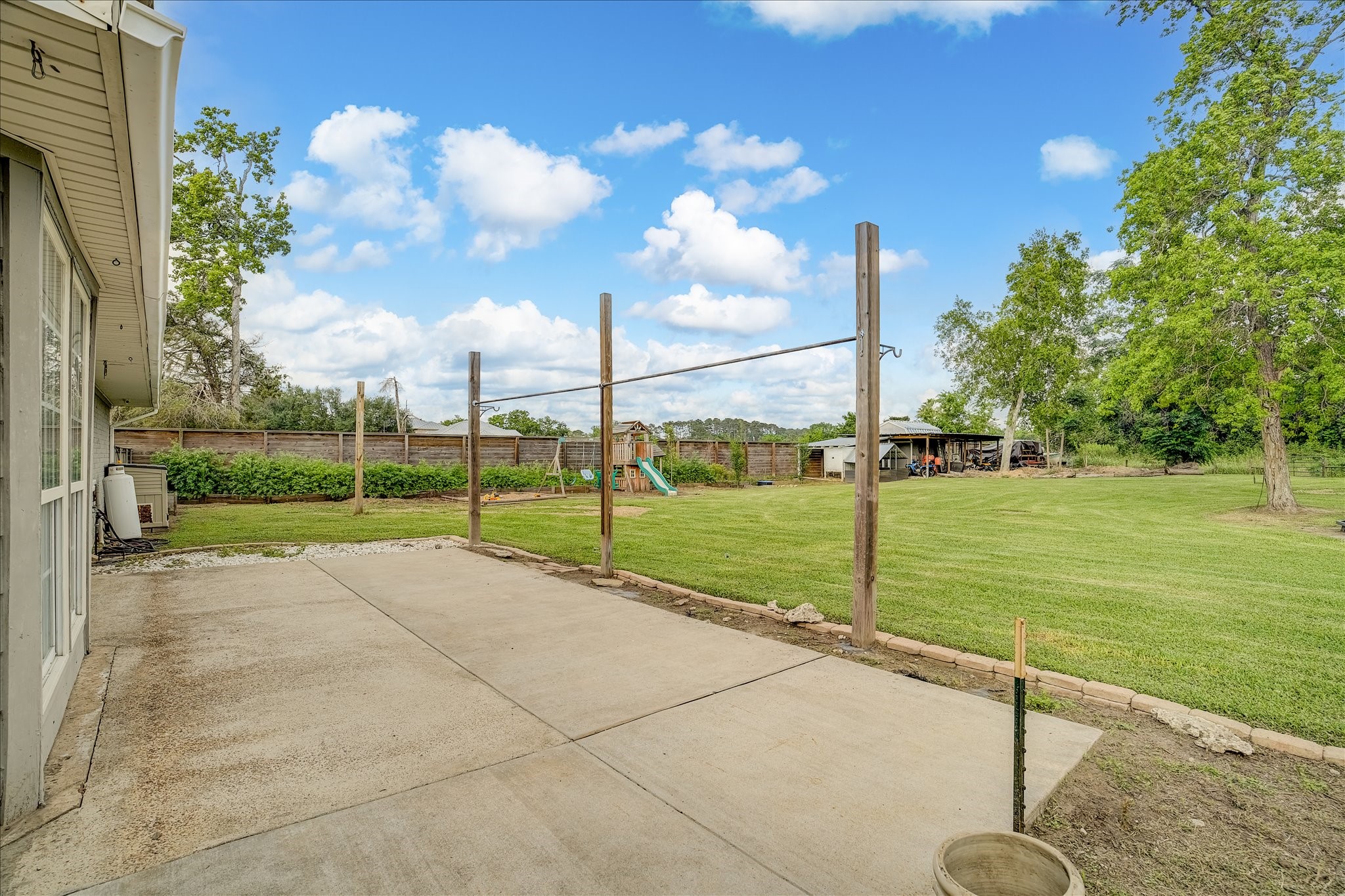 3205 Cemetery Road Santa Fe, TX 77517 - Photo 33 of 43 Patio overlooking the vast landscape