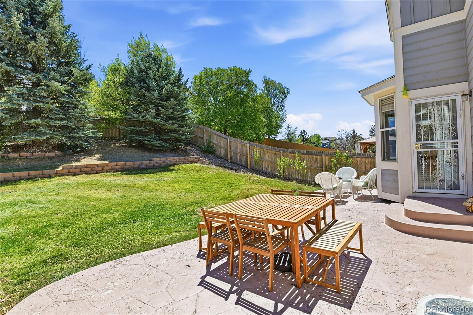 10468 Wagon Highlands Ranch Littleton, CO 80130 - Photo 43 of 48 a view of yard with patio