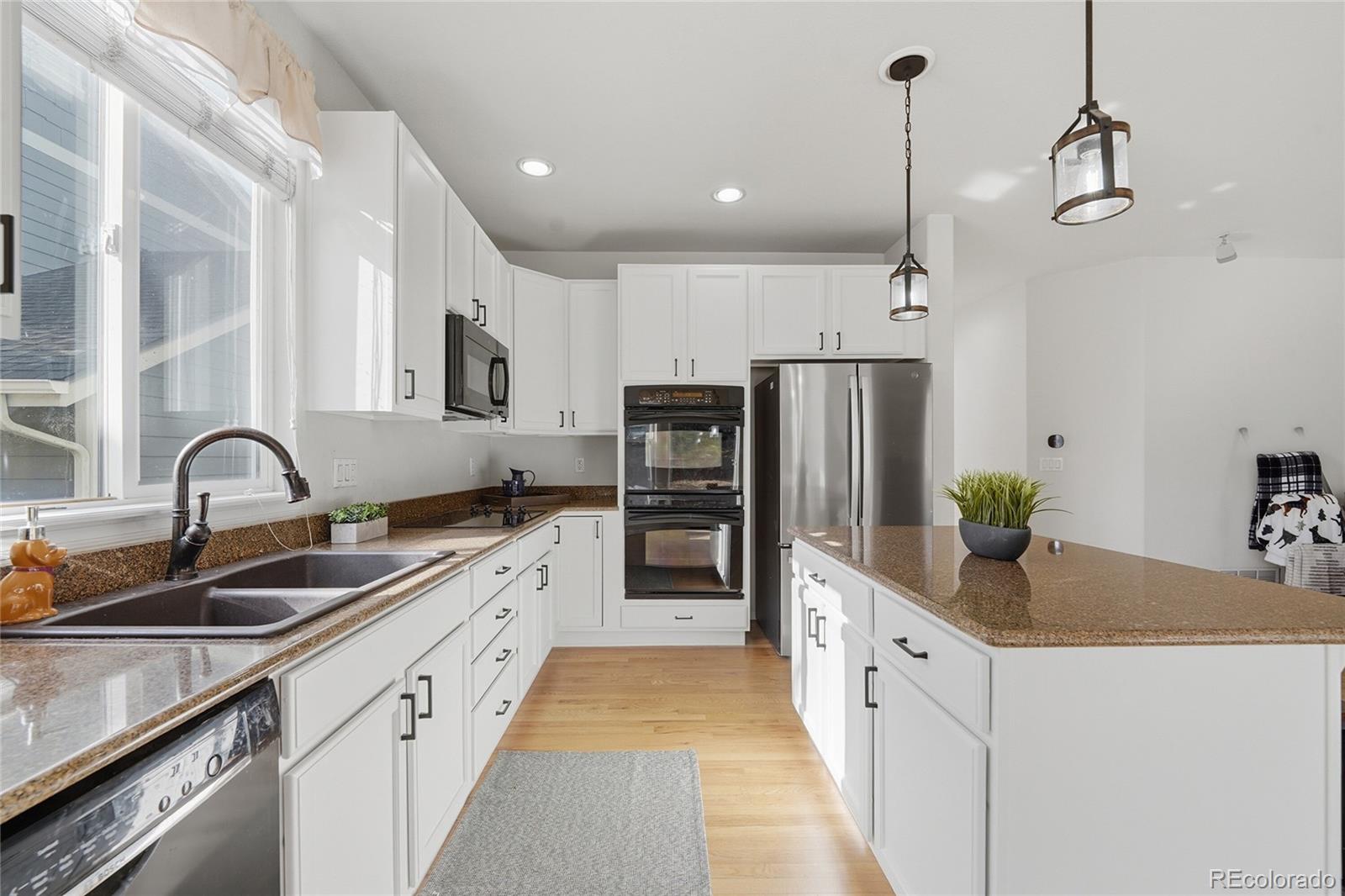 10468 Wagon Highlands Ranch Littleton, CO 80130 - Photo 9 of 35