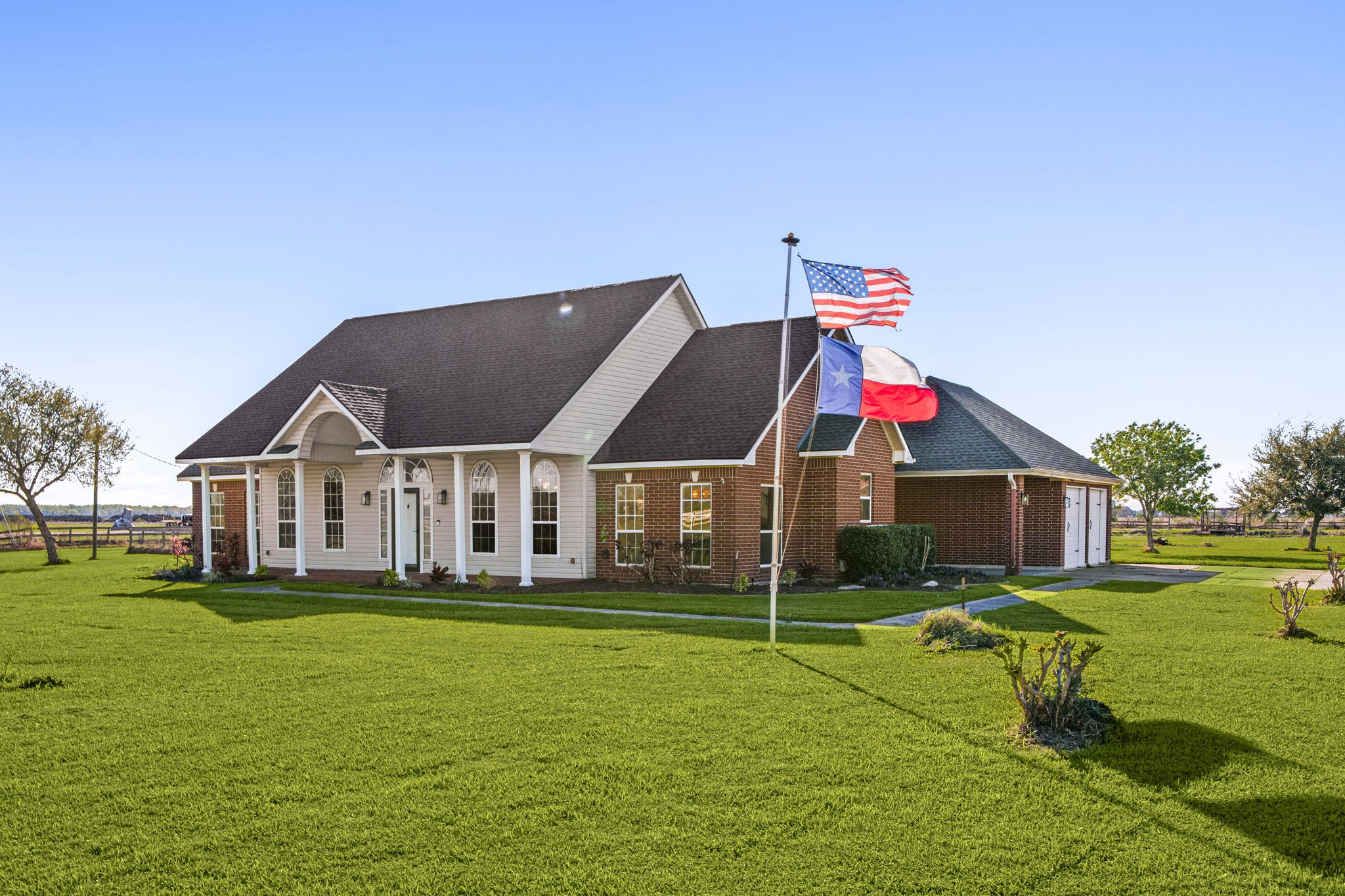 7740 Farm To Market 1462 Rosharon, TX 77583 - Photo 1 of 35 a house with garden in front of it