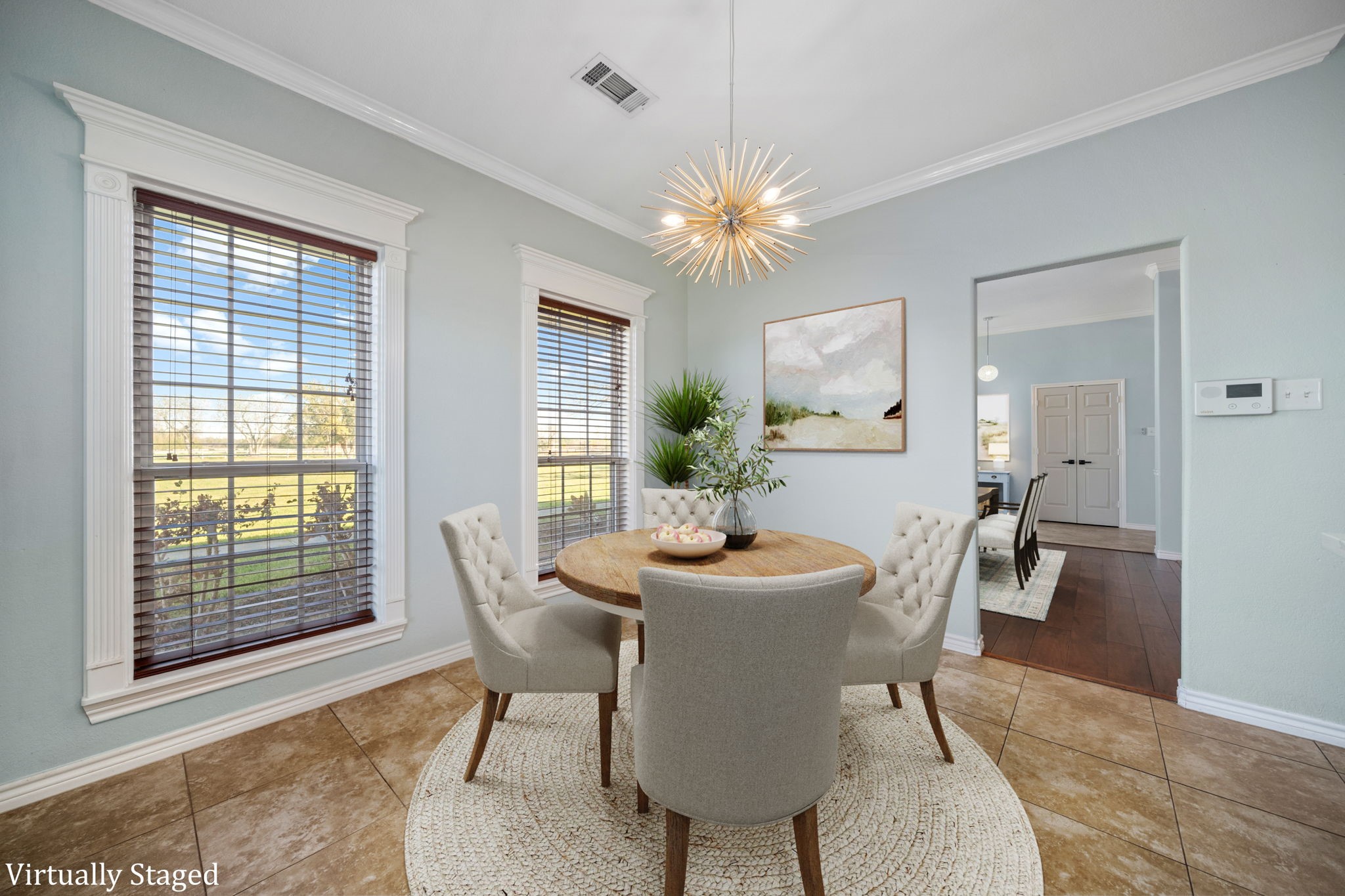 7740 Farm To Market 1462 Rosharon, TX 77583 - Photo 12 of 35 a dining room with furniture a window and wooden floor